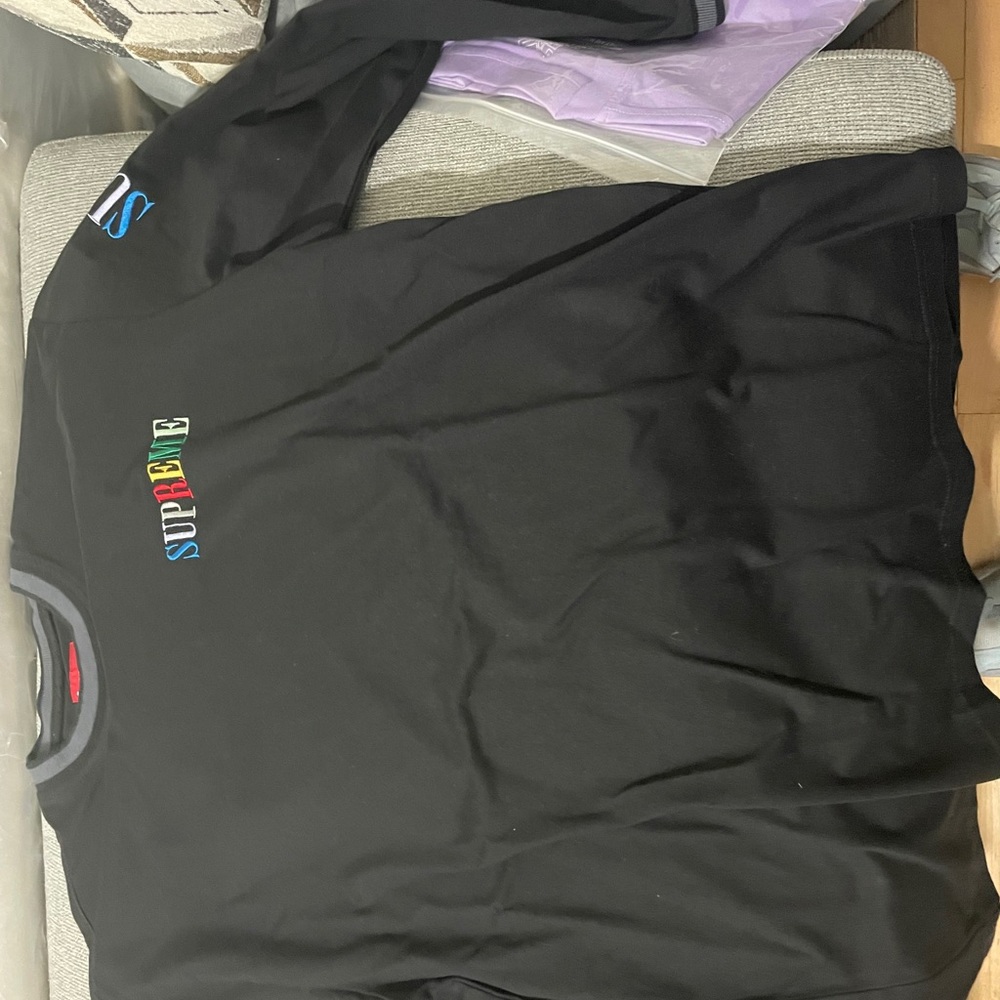 Supreme multi color logo